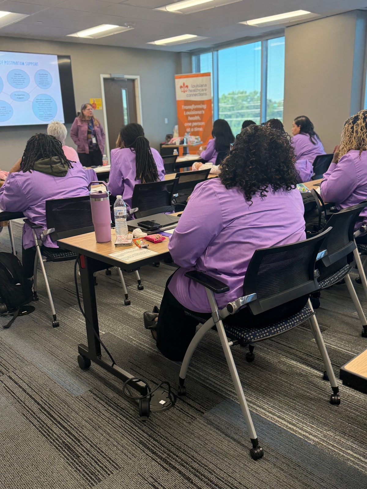 A postpartum support lecture in progress